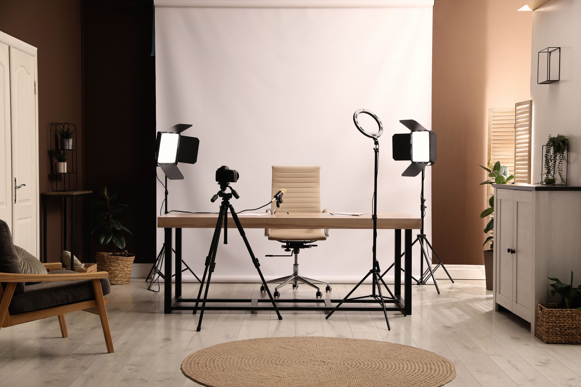 Modern blogger's workplace with professional equipment in room